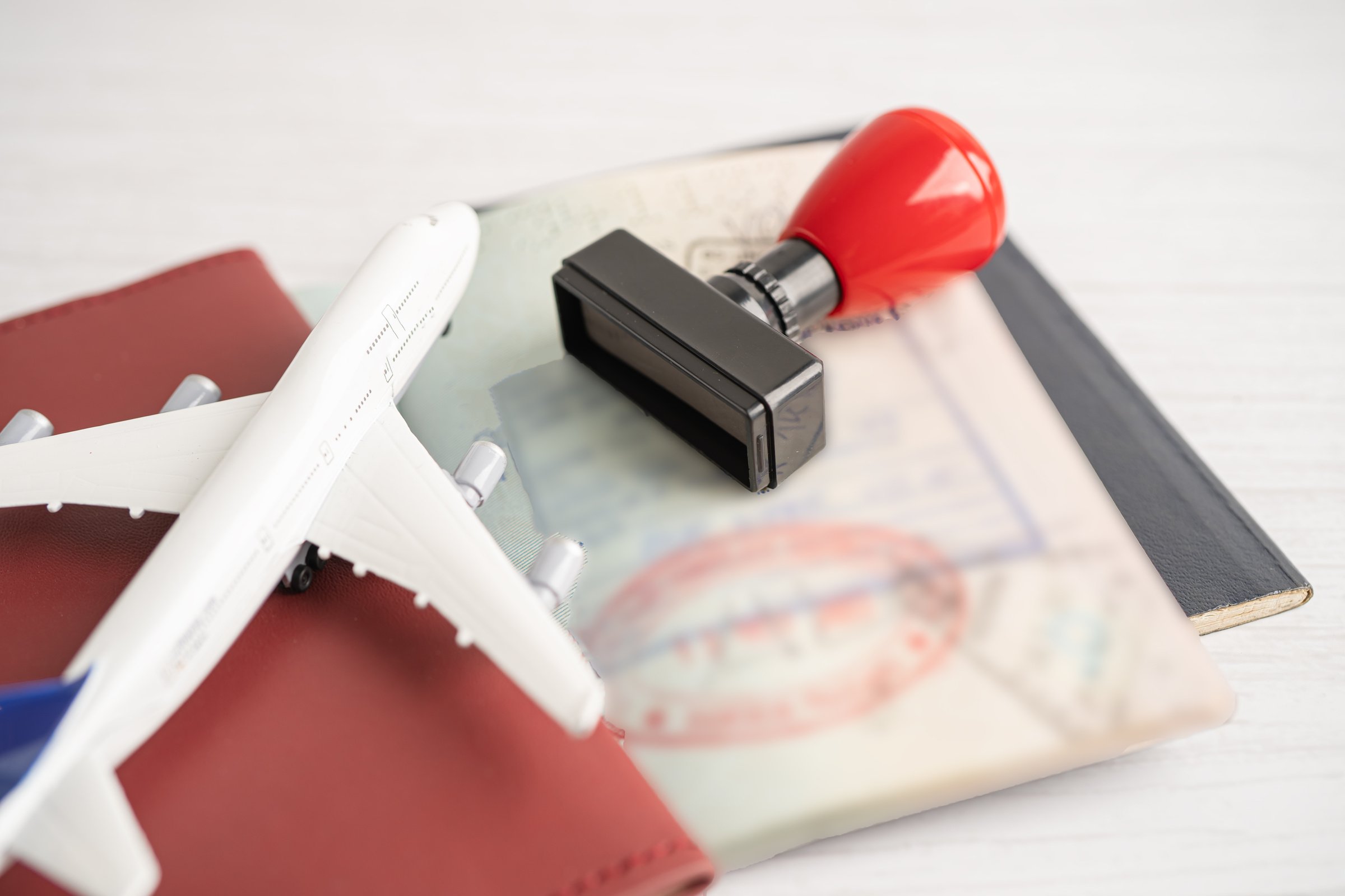 Approved Stamp visa and passport document to immigration at airport in country.